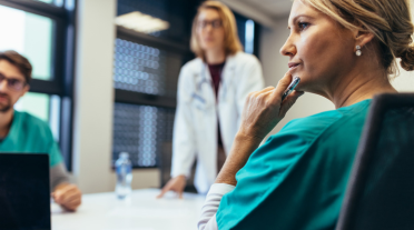 female health professional and two colleagues (AYA for health professionals)